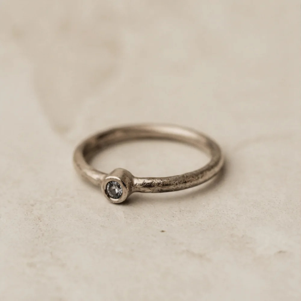 Trace Ring shown alone — recycled silver · lab-grown diamond